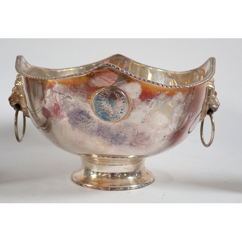 187 - A collection of silver plate including a footed bowl set Georgian coin, two silver plate tankards an... 
