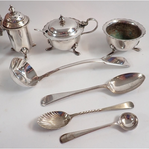 192 - A group of various silver plated items including biscuit box, cruets etc.