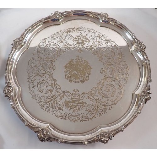 201 - A large Victorian silver plated salver, 43cm diameter, another salver on claw feet, two further salv... 