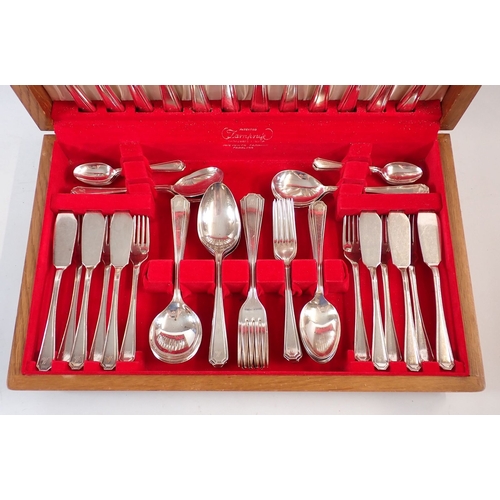 204 - An oak canteen containing Insignia plate six person cutlery setting including dinner, fish and desse... 