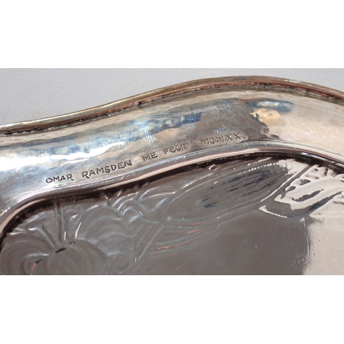 208 - An Arts & Crafts silver tray by Omar Ramsden engraved flowers, dove and 'Hilda' all within hammered ... 