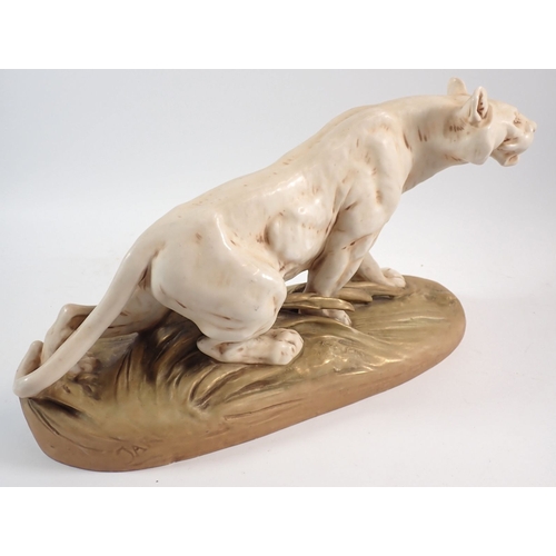 21 - A Royal Dux large tiger, 40cm long