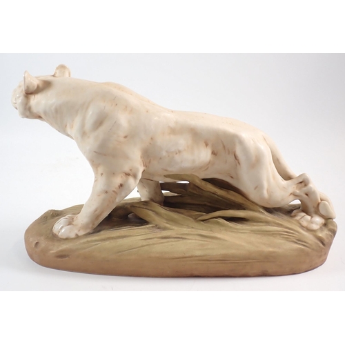 21 - A Royal Dux large tiger, 40cm long