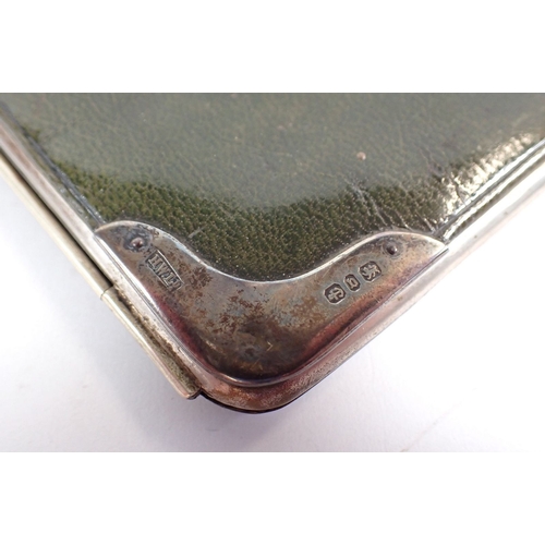 230 - A Victorian green leather silver mounted wallet by Henry Williamson Ltd, Birmingham 1876, 14cm long