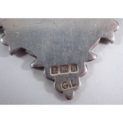 237 - A group of silver to include two spoons, a medal and a thimble, 51g plus an unmarked white metal spo... 
