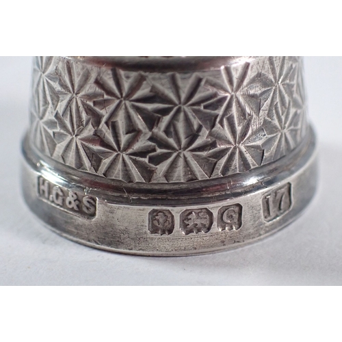 237 - A group of silver to include two spoons, a medal and a thimble, 51g plus an unmarked white metal spo... 