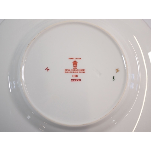 37 - A pair of Royal Crown Derby Imari tea cups and sugar bowl plus five tea plates, 16cm diameter