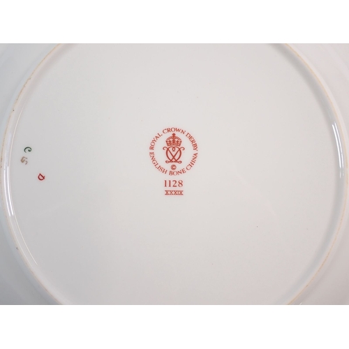 38 - A Royal Crown Derby Imari pair of dinner plates, pattern No. 1128, 27cm diameter