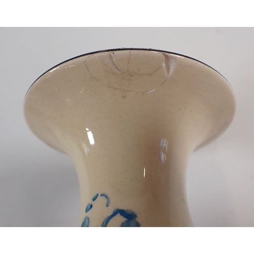 44 - Clarice Cliff 'Gay Day' candlesticks, a/f plus a Clarice Cliff Fantasque Bizarre beaker/cup in the b... 