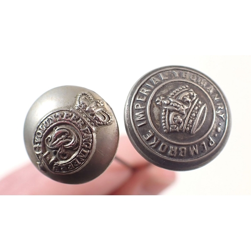 590 - Two trench art hat pins, one topped with Queen Victoria's volunteer engineers button and the other P... 