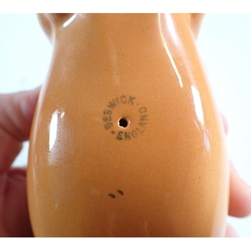 8 - Four Beswick horses - Black Beauty, Palomino and two brown, tallest 21cm high