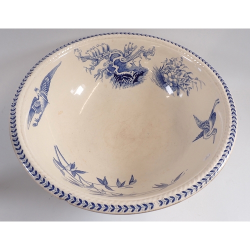 26 - A blue and white group including Yeddo pattern toiletry bowl, various jugs and bowl plus a faience c... 