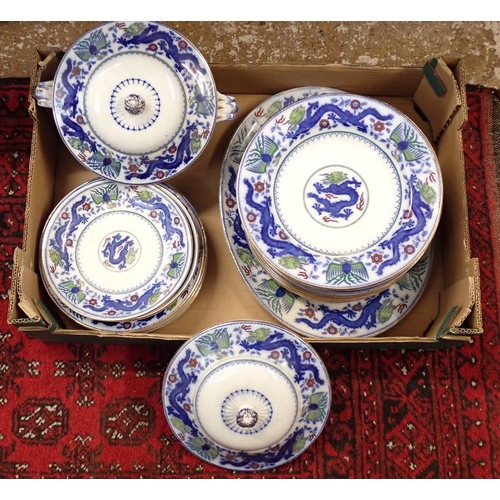 31 - A quantity of Minton and Co Chinese Dragon and Bird design dinner ware comprising thirteen dinner pl... 