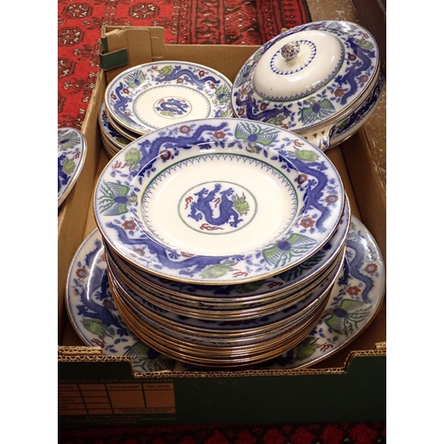 31 - A quantity of Minton and Co Chinese Dragon and Bird design dinner ware comprising thirteen dinner pl... 