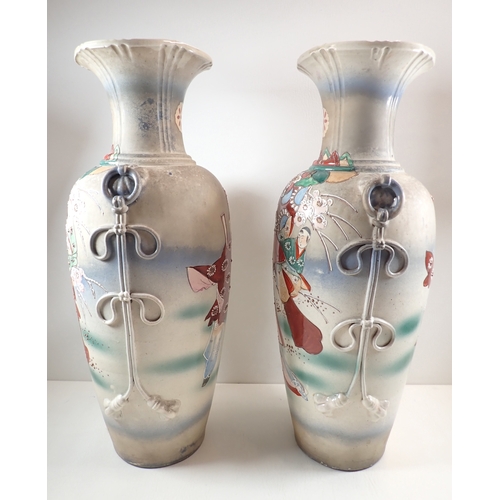 4 - A pair of Japanese large floor vases painted polychrome figural detail with applied rope styled hand... 