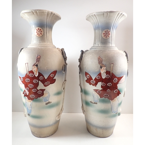 4 - A pair of Japanese large floor vases painted polychrome figural detail with applied rope styled hand... 