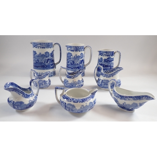 43 - A collection of Spode Italian jugs including a graduated set of three milk jugs another graduated se... 