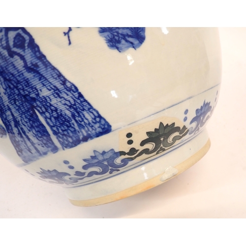 5 - A pair of Chinese blue and white jardinieres decorated cranes each on a Chinese blue and white plate... 