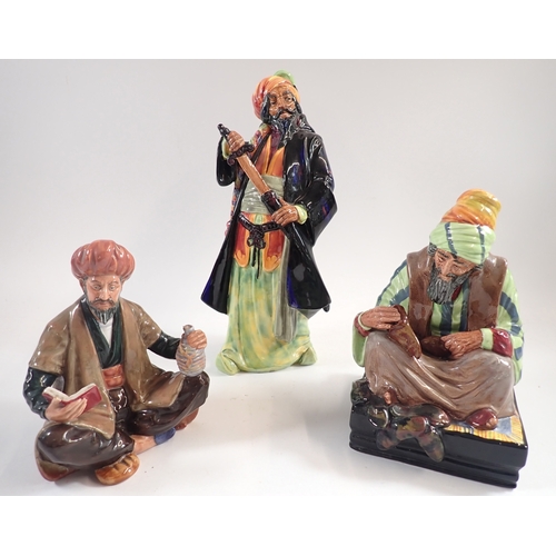 52 - Three Middle Eastern Royal Doulton figures - The Cobbler HN1706, Omar Khayyan HN2247 and Blue Beard ... 
