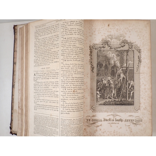 680 - A circa 1850 large Family Holy Bible with a complete commentary containing the Apocrypha and New Tes... 