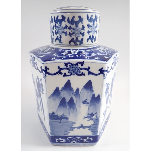 9 - A modern Chinese blue and white hexagonal ginger jar decorated birds and mountain scenes, 29cm tall