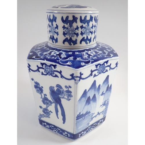 9 - A modern Chinese blue and white hexagonal ginger jar decorated birds and mountain scenes, 29cm tall