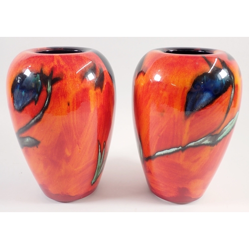 10 - A pair of Poole Pottery Himalayan Poppy vases, 22cm
