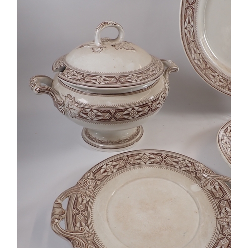 24 - Two large Victorian brown printed meat plates, largest 55cm wide and four other plates 'Tudor' by P ... 