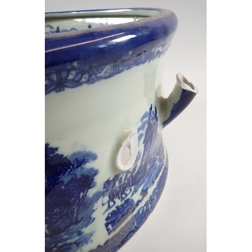 25 - Two Victorian blue and white style foot baths, 46cm long, one having handle a/f