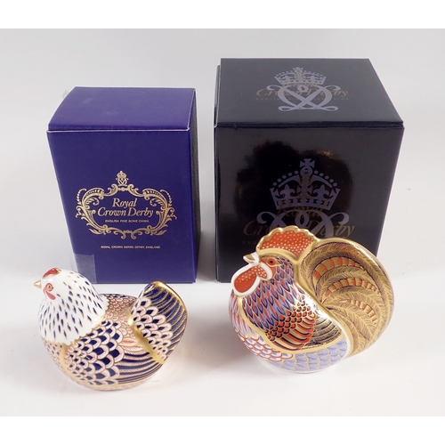 28 - Two Royal Crown Derby paperweights - cockerel and hen, 9.5cm wide, both boxed