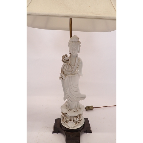 3 - A pair of large Chinese blanc de chine porcelain figurative table lamps and shades, 97cm tall