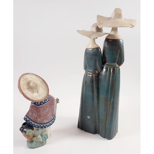 32 - A Lladro figure of two nuns, 34cm and one of a Mexican boy 'Pedro with Jug' No.12141 - both boxed