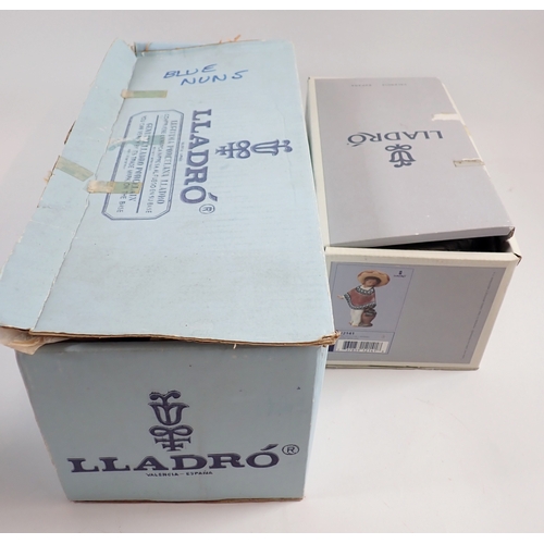 32 - A Lladro figure of two nuns, 34cm and one of a Mexican boy 'Pedro with Jug' No.12141 - both boxed