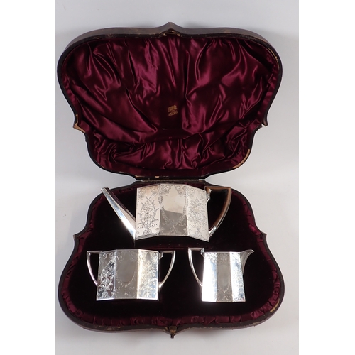 326 - A Victorian silver three piece tea service, octagonal form with foliage engraved decoration in origi... 