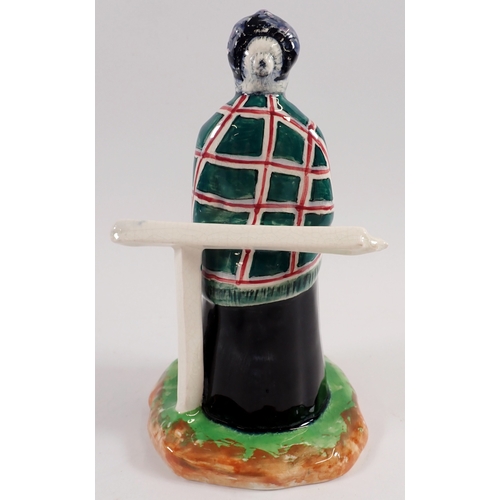 43 - A Crown Devon figure of an old woman 'Old Kate' 20cm