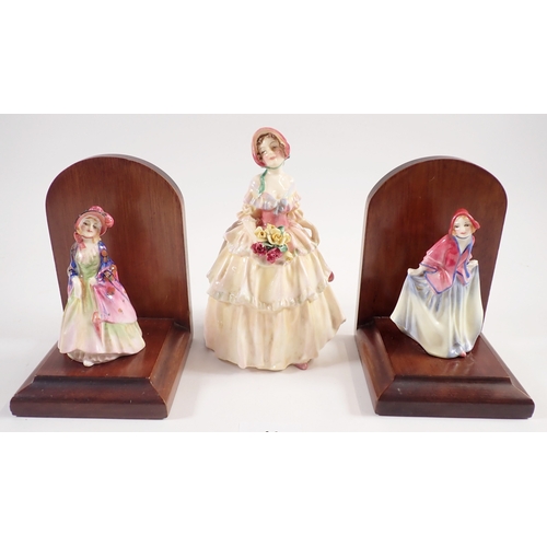 44 - A pair of Royal Doulton porcelain and wood figure bookends and another Royal Doulton figure Irene HN... 