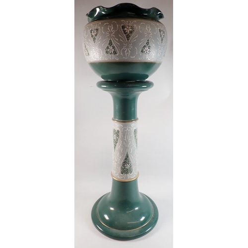 5 - A Langley Ware stoneware green jardiniere on stand, 72.5cm