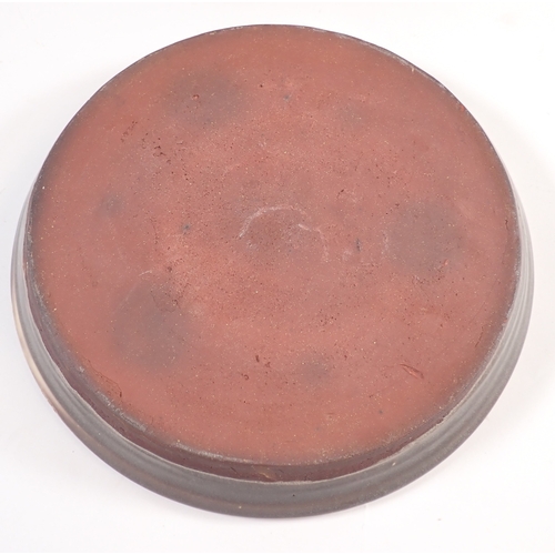58 - A Studio pottery covered dish, 21cm diameter