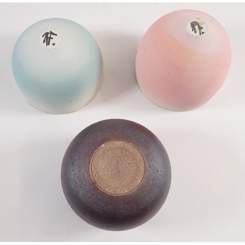 60 - Two studio pottery bowls with ombre decoration plus another bowl with pierced rim