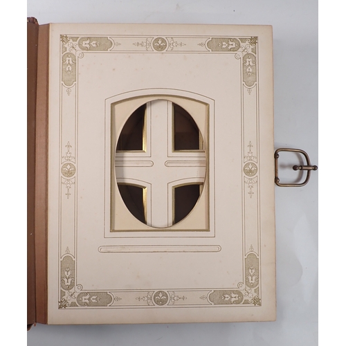 653 - A Victorian leather and gilt photograph album - empty