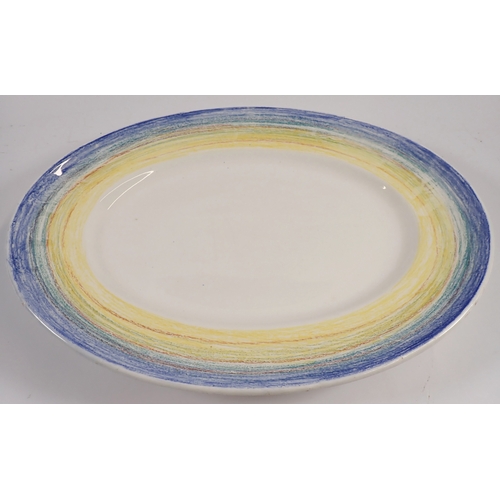 7 - A Clarice Cliffe Bizarre crayon edge meat plate with blank centre, 42cm