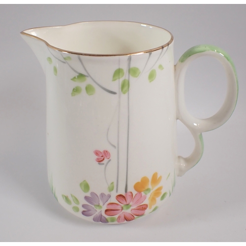 10 - A 1930's floral painted tea service comprising five cups, six saucers, jug and two sugar bowls