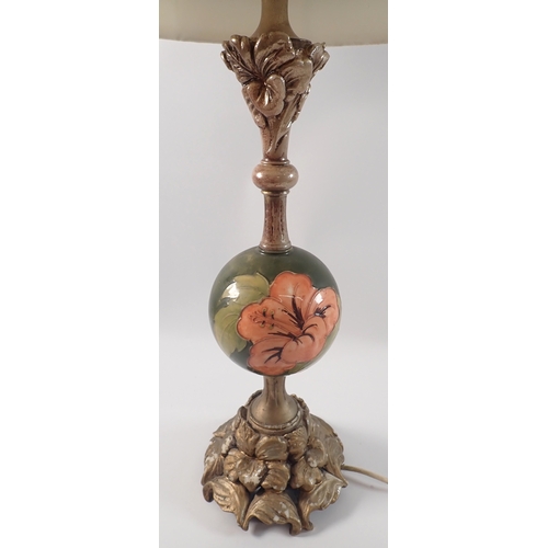 13 - A Moorcroft Hibiscus lamp with resin mounts, 65cm tall with shade