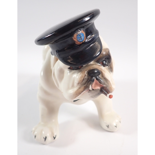 14 - A Crown Devon Fieldings model of a bulldog, smoking a cigar and wearing a Naval cap (Churchill), 11.... 