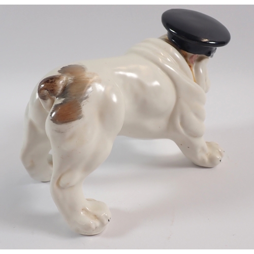 14 - A Crown Devon Fieldings model of a bulldog, smoking a cigar and wearing a Naval cap (Churchill), 11.... 