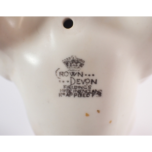 14 - A Crown Devon Fieldings model of a bulldog, smoking a cigar and wearing a Naval cap (Churchill), 11.... 