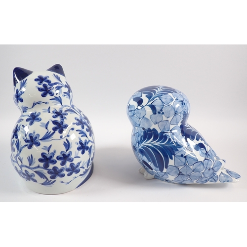 22 - A Librasco blue and white owl plus a similar cat, 18.5cm tall