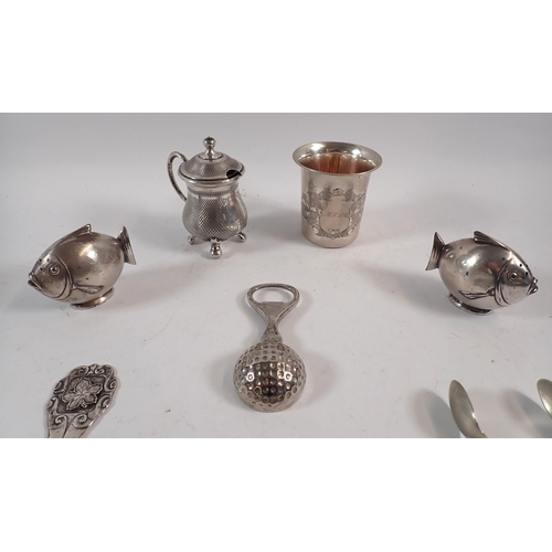 233 - A collection of white metal items