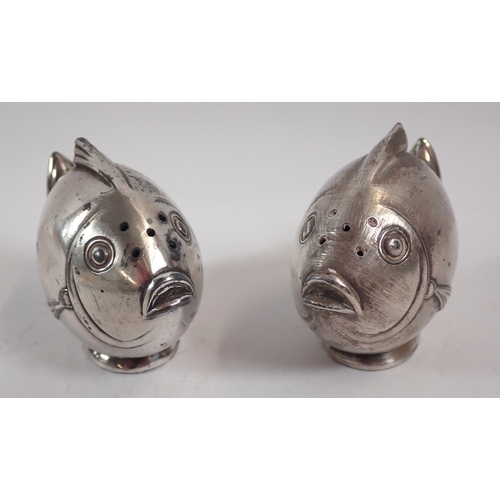 233 - A collection of white metal items