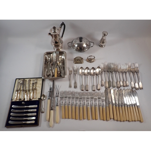 242 - A group of silver plated items including water jug, serving dish, cutlery etc.